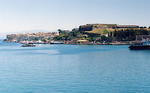 A view of the Greek island of Corfu from a ferry crossing the Corfu straits.
