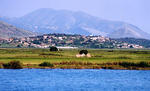 A view from Butrint of an Albanian village built upon the ruins of a former Roman settlement.