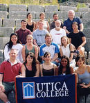 UC's international archaeological field school team poses on the steps of Butrint's theater, which was built by the Greeks and later remodeled by the Romans.