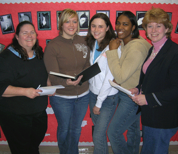 OT students discuss research project with faculty member Tory Nackley