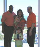 UC's Brian Agnew '03 and Mark Kovacs with UC Alumna Desire Gagne '93 and family (Logan & Skye)