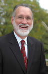 Dr. Todd S. Hutton, President of Utica College