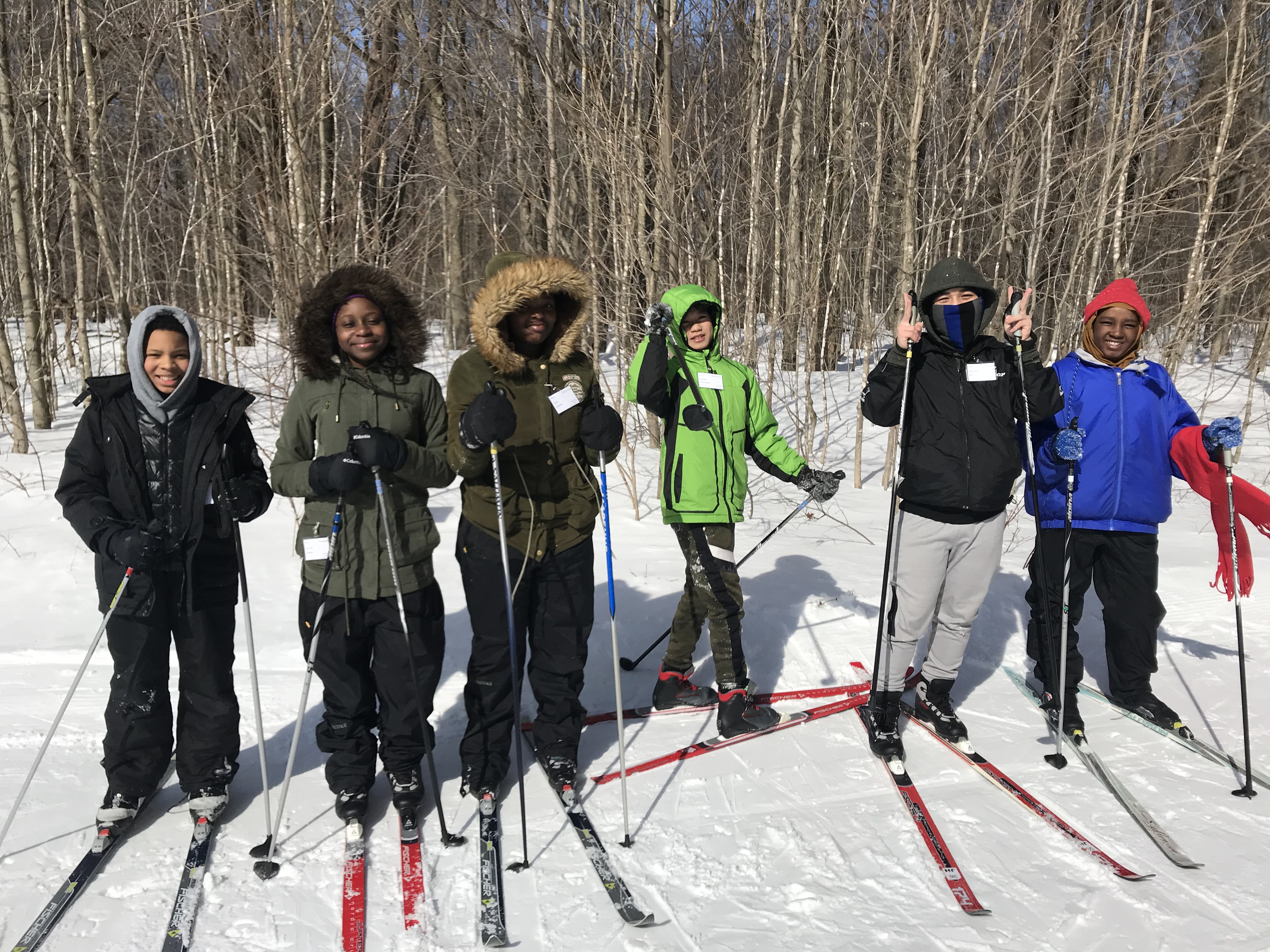 JFK students pose before cross-country skiing at Black River Outdoor Education Program