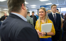 Young woman speaking with an employer.