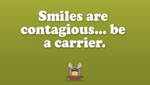 Sign reading: Smiles are contagious...be a carrier.