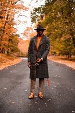 Marquis Simpson stands in road on a fall day.