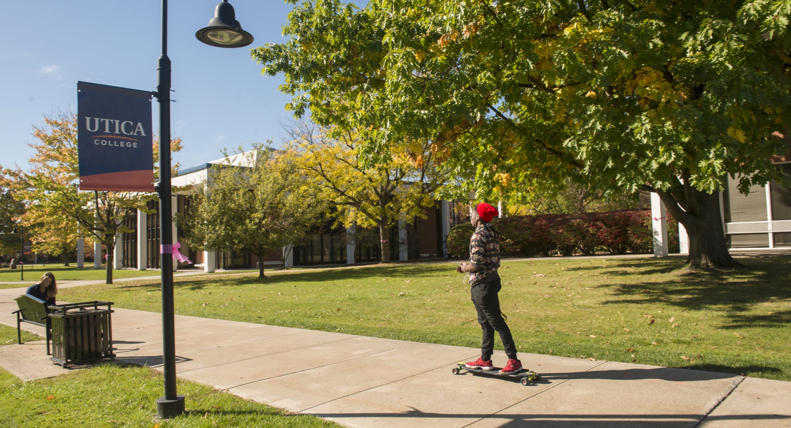 Fall Campus with Skateboarder