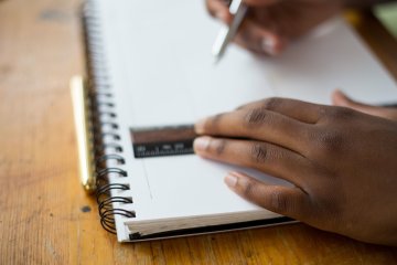 Hands in Notebook Classroom Teaching generic