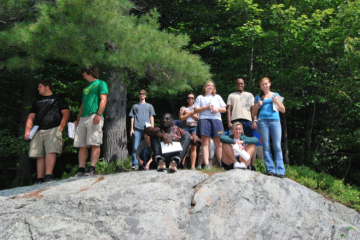 Geoscience Students on top of rock