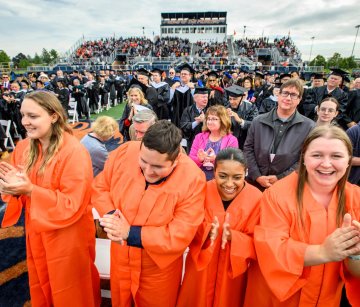 Students clap for Todd Pfannestiel at the 2023 Presidential Inauguration.