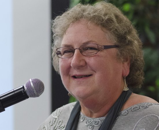Kim Landon at microphone