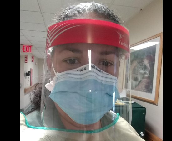 Melissa Ortiz Dorset in face mask and shield in hospital.