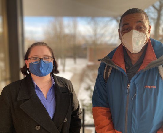 Students Erin Taylor and Stacey Webb smiling behind their masks.