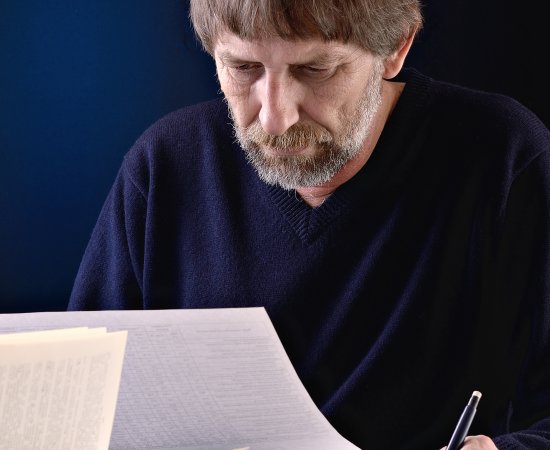 An older than traditional student conducts work.