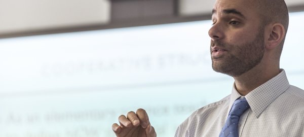 Teacher at front of classroom header