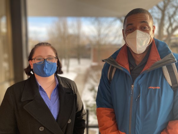 Students Erin Taylor and Stacey Webb smiling behind their masks.