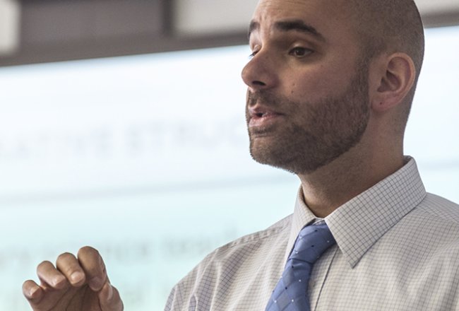 Teacher at front of classroom header