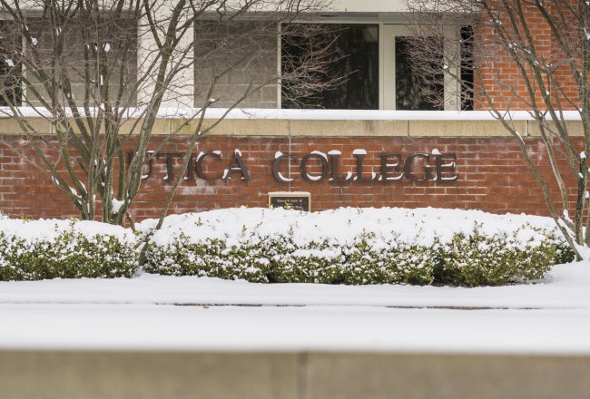 UC Name on Campus with snowy bushes DSC0187