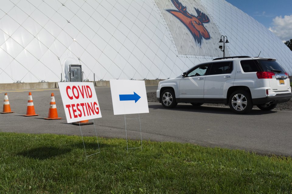 Sign outside COVID-19 testing site on campus.