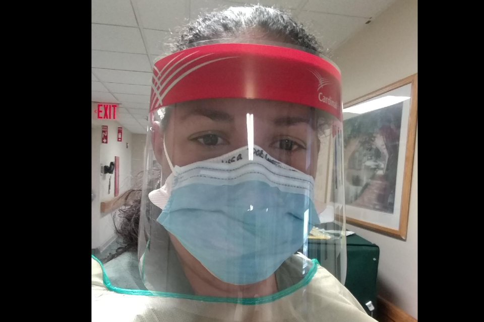 Melissa Ortiz Dorset in face mask and shield in hospital.