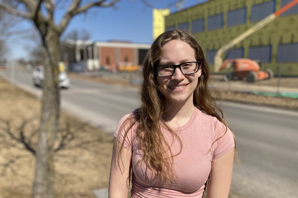 Neuroscience major Taylor Brown '22 stands in front of the under-construction Science Center expansion.