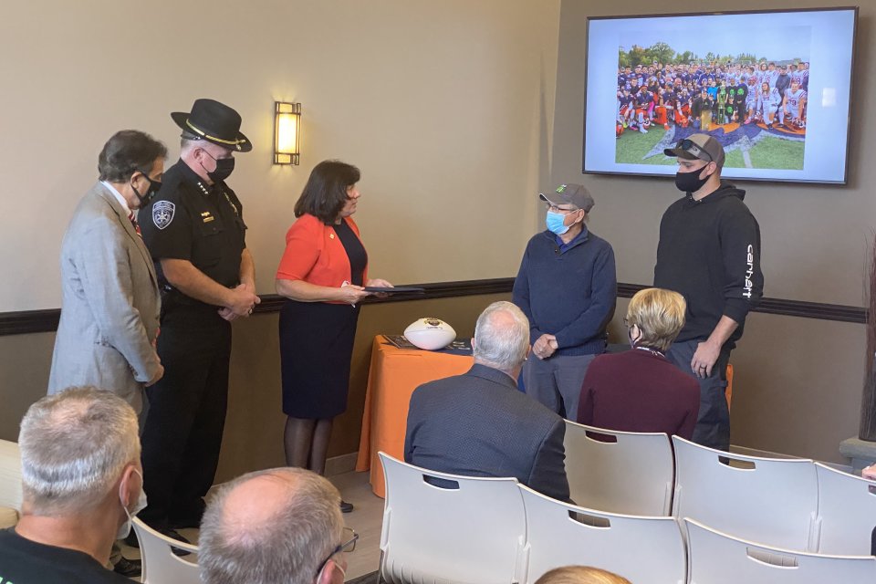 Ceremony at Utica College to recognize two local volunteer firefighters as honorary Pioneer captains.