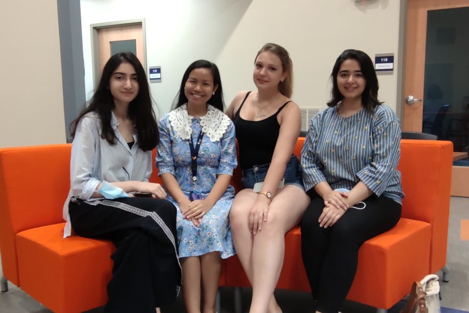 Four new exchange students in the Wilcox Center, Fall 2021